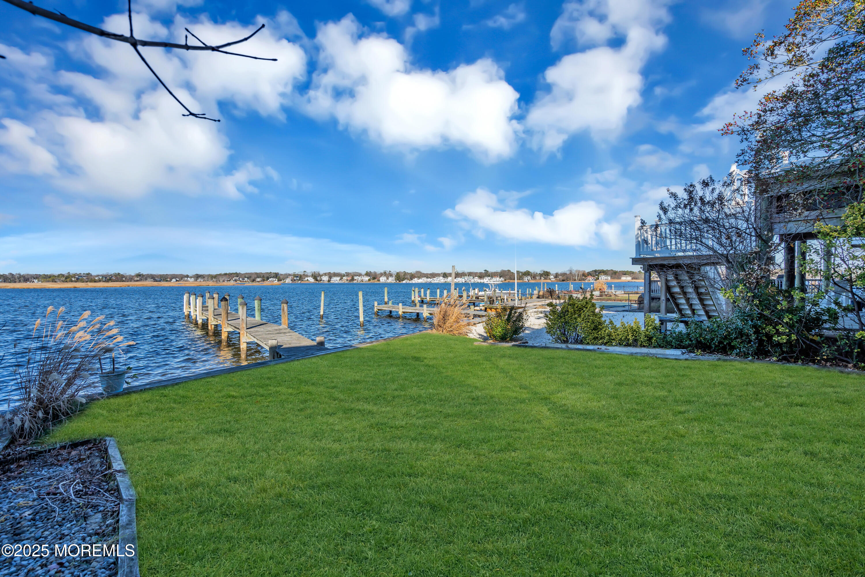 3 Metedeconk Road Brick, NJ 08723 - Photo 9 of 28 a view of a big yard with a house in the background