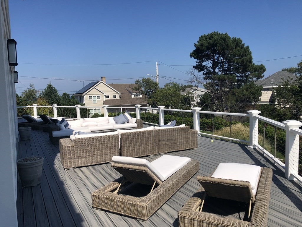 15 Wyoma Road Gloucester, MA 01930 - Photo 8 of 11 a view of a roof deck with couches