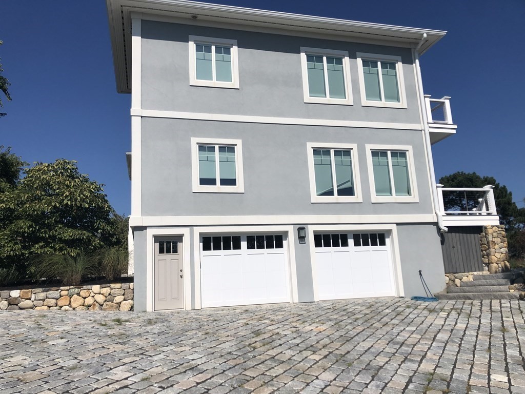 15 Wyoma Road Gloucester, MA 01930 - Photo 9 of 11 a house view with a outdoor space