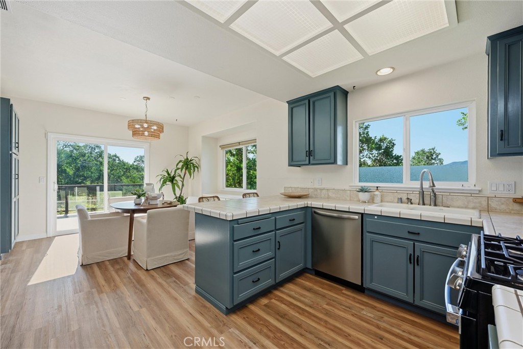 19345 Moon Ridge Road Hidden Valley Lake, CA 95467 - Photo 41 of 64 a kitchen with a sink appliances and cabinets