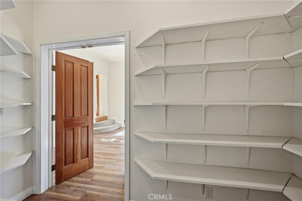 19345 Moon Ridge Road Hidden Valley Lake, CA 95467 - Photo 61 of 64 a view of walk in closet with empty racks