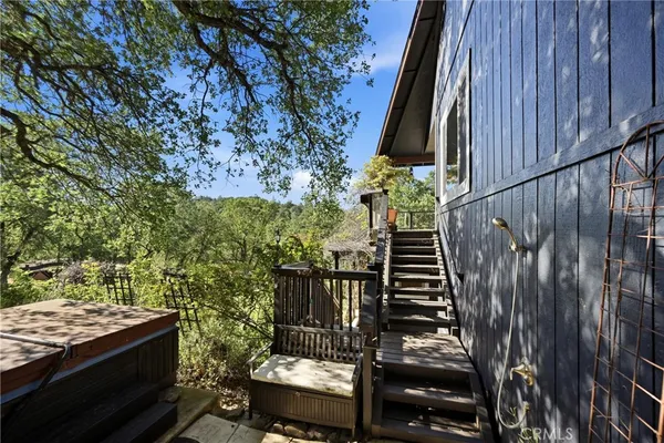 a view of a backyard with wooden floor