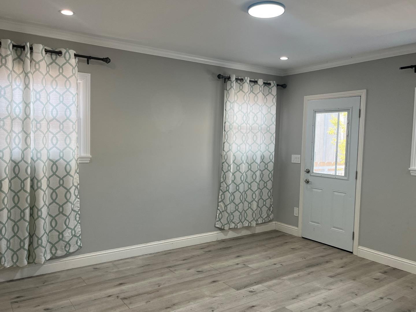 1073 Eighth Street Monterey, CA 93940 - Photo 9 of 11 a view of entryway with wooden floor