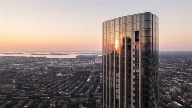 a view of a city with tall buildings