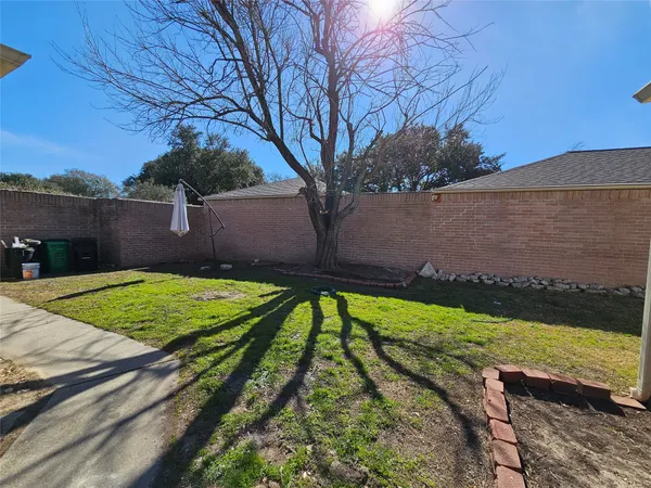 a view of outside space and a yard