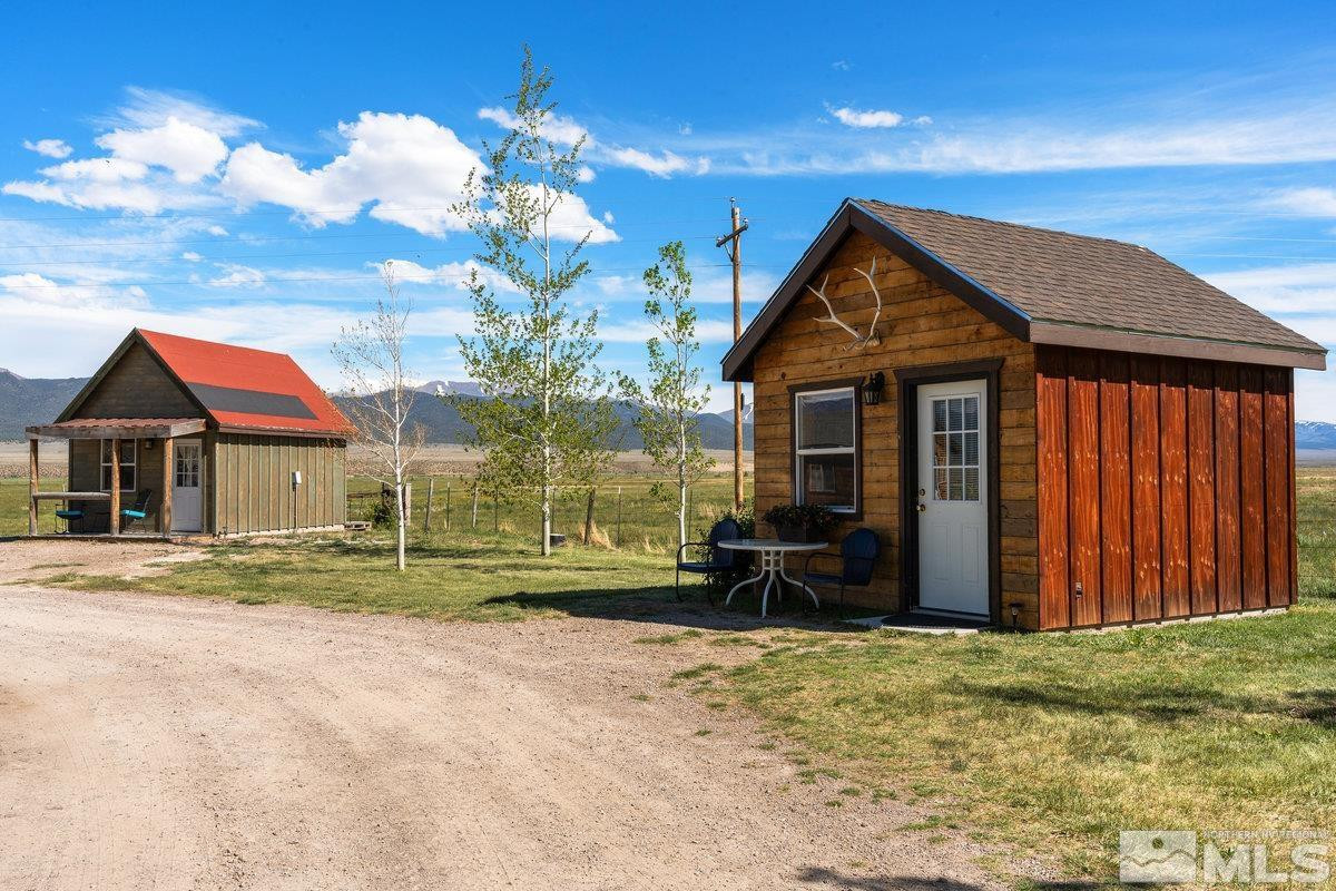 10977 Austin Road Austin, NV 89310 - Photo 22 of 40 a front view of a house with a yard