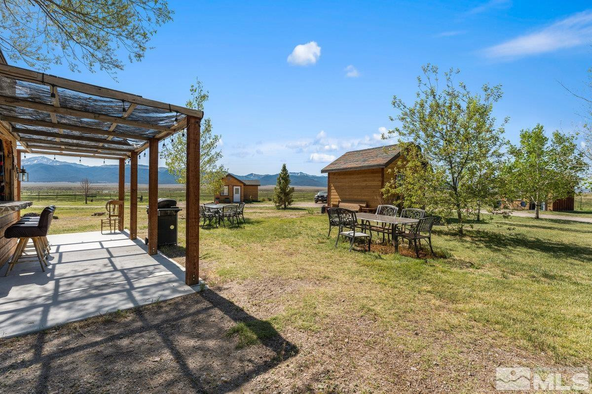 10977 Austin Road Austin, NV 89310 - Photo 32 of 40 a view of a swimming pool with a patio