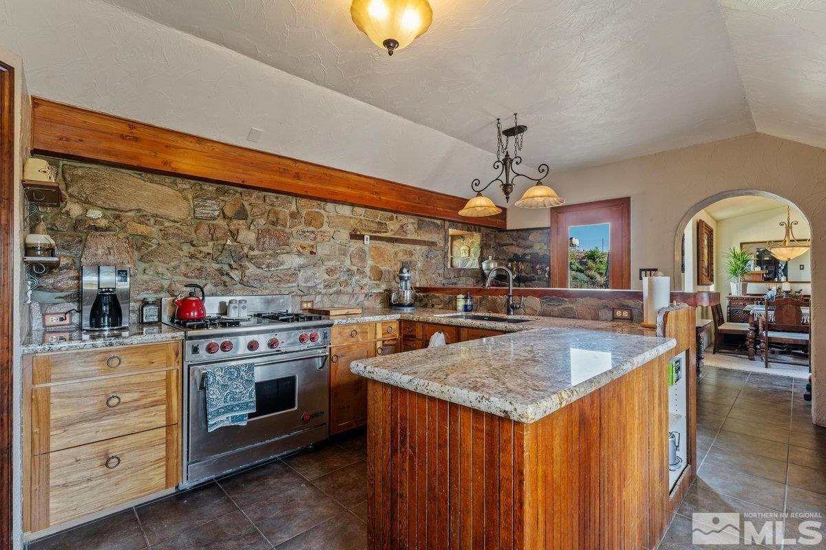 10977 Austin Road Austin, NV 89310 - Photo 7 of 40 a kitchen with stove and cabinets
