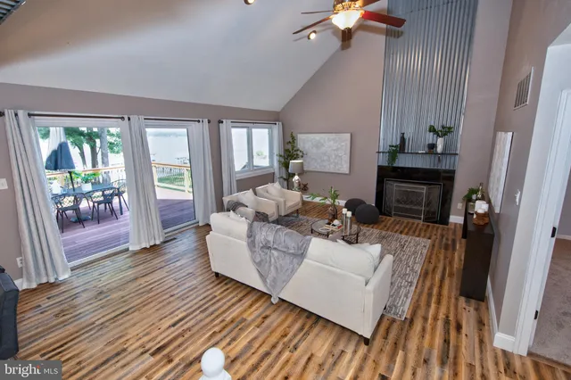 a view of entryway with wooden floor and stairs