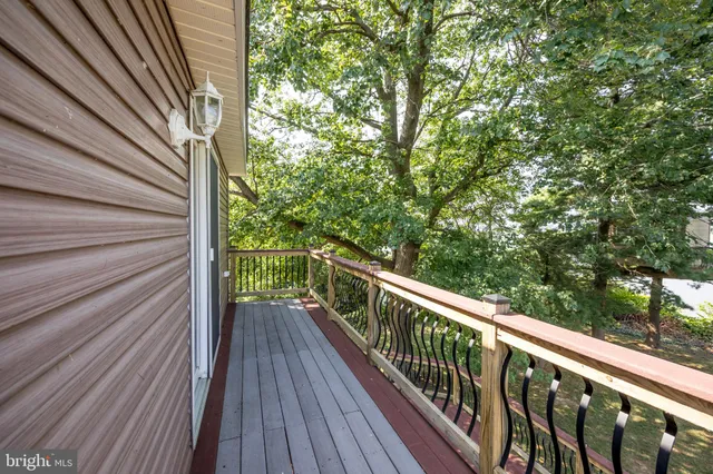 a view of a chairs and table on the wooden floor