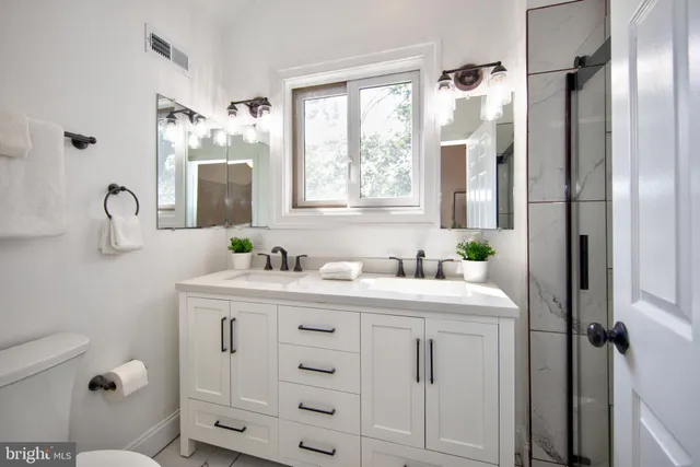 a view of balcony with wooden floor and fence