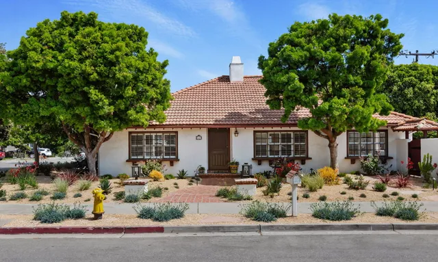 front view of a house with a small yard