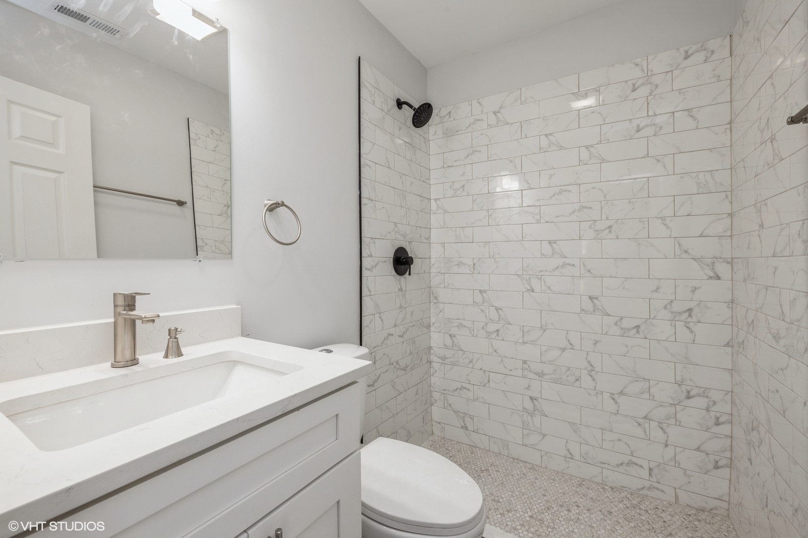 78 Pine Avenue Riverside, IL 60546 - Photo 9 of 13 a bathroom with a sink a toilet and shower