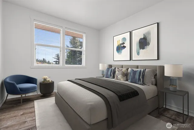 a bedroom with a bed and window