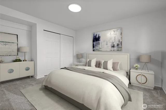 a bedroom with a bed and window