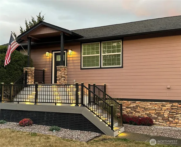 a front view of a house with a glass door