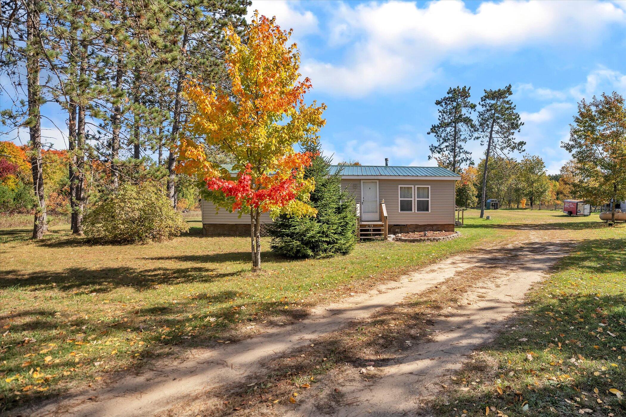 2420 Darke Road Kalkaska, MI 49646 - Photo 2 of 32 03-2420-Darke-Rd-WindowStill-Real-Estate