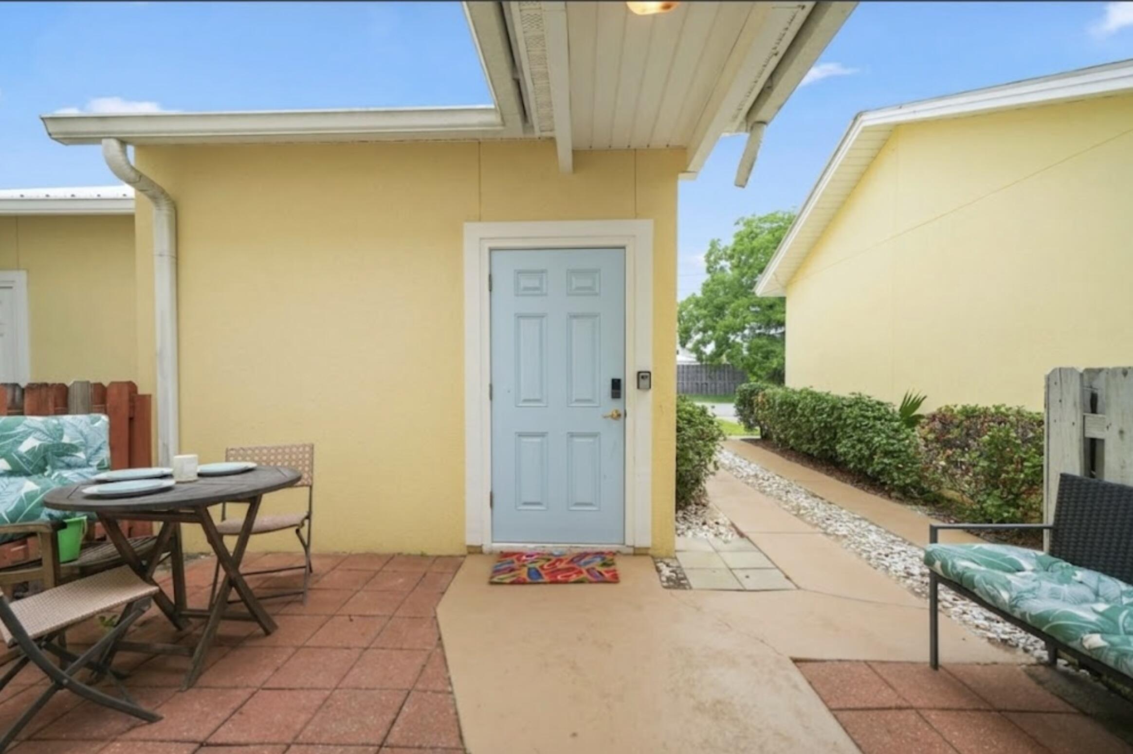 450 South Geronimo Street, Unit 102 Miramar Beach, FL 32550 - Photo 35 of 39 Patio and Garage