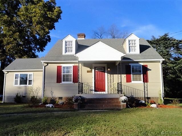 2100 Springdale Road Richmond, VA 23222 - Photo 1 of 28 a front view of a house with a yard