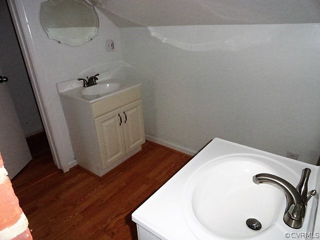 2100 Springdale Road Richmond, VA 23222 - Photo 23 of 28 a bathroom with a sink and mirror