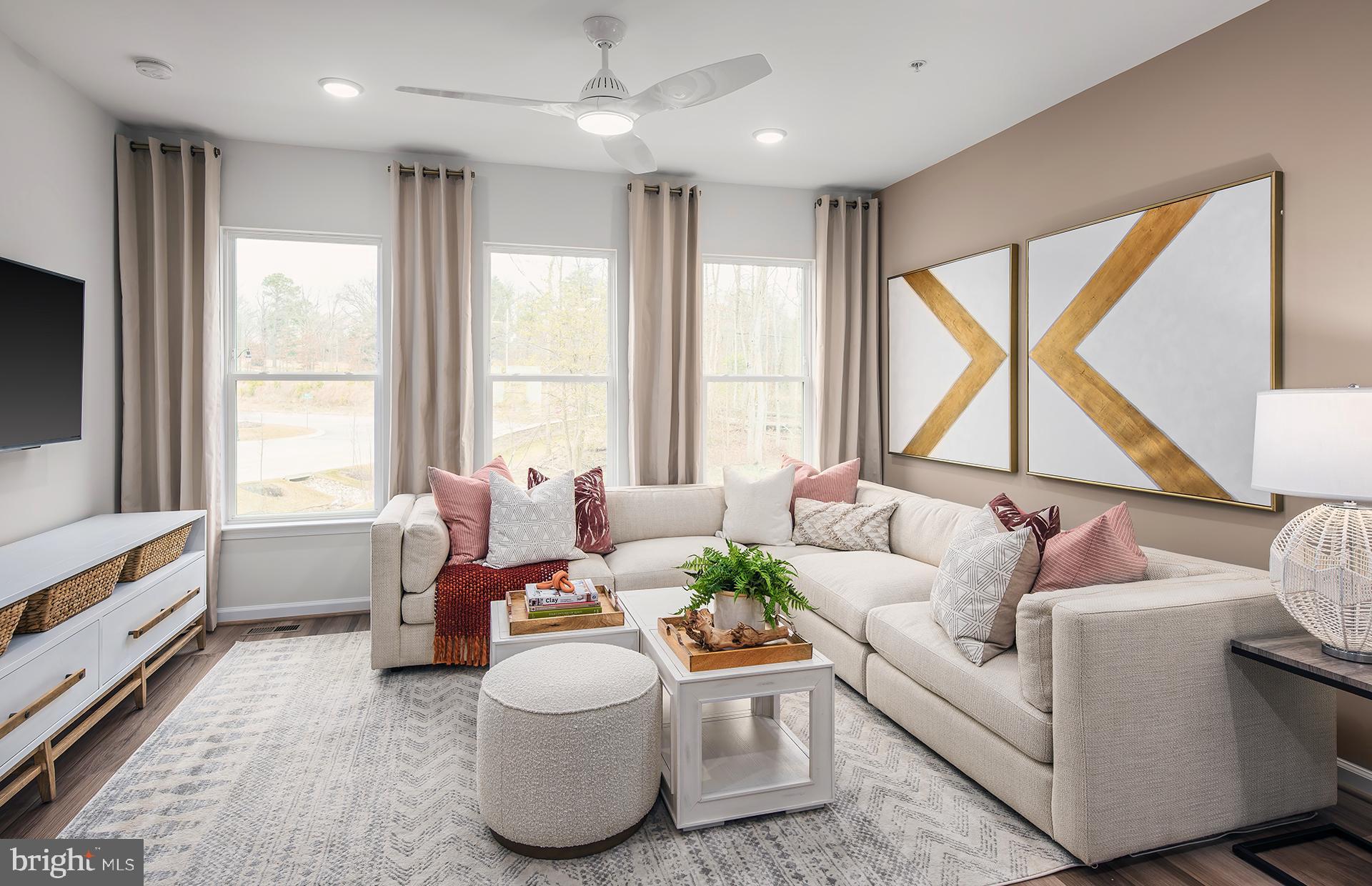 201 Intertidal Lane Laurel, MD 20724 - Photo 6 of 29 a living room with furniture and a large window