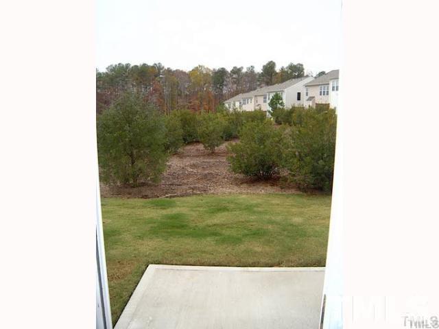 8213 Saltwood Place Raleigh, NC 27617 - Photo 13 of 13 a view of a yard