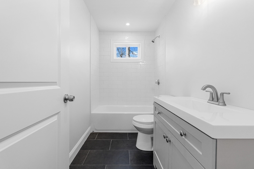 15 Jean Street Acushnet, MA 02743 - Photo 29 of 42 a bathroom with a sink toilet and shower
