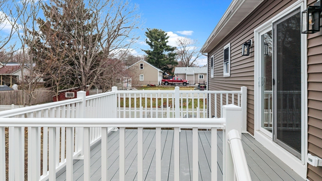 15 Jean Street Acushnet, MA 02743 - Photo 3 of 42 a view of a house with wooden deck