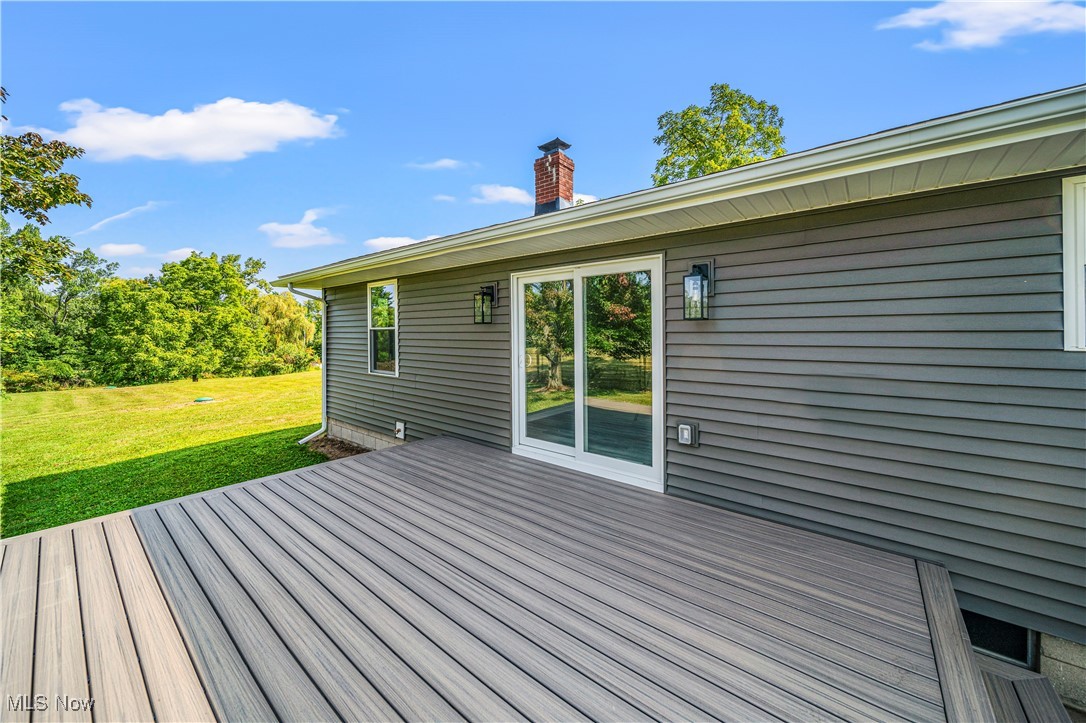 2049 Barnum Road Geneva, OH 44041 - Photo 32 of 33 Wooden terrace featuring a yard