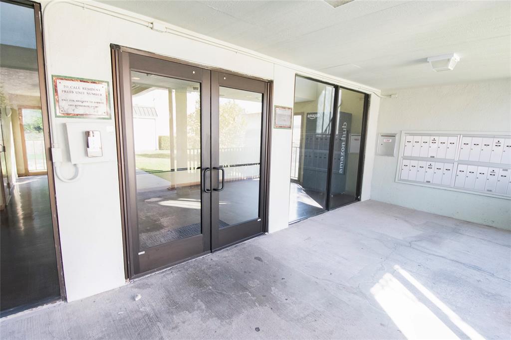 11460 Audelia Road, Unit 272 Dallas, TX 75243 - Photo 20 of 27 a view of a bathroom with a glass door shower