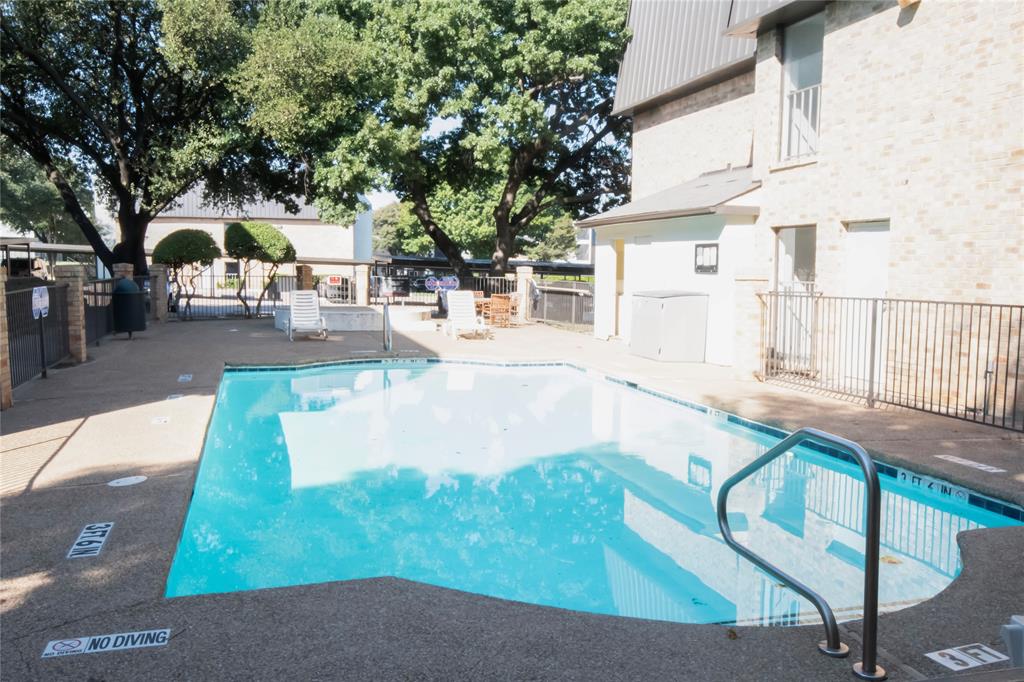 11460 Audelia Road, Unit 272 Dallas, TX 75243 - Photo 22 of 27 a view of a patio with couches and table and chairs with wooden fence and large trees
