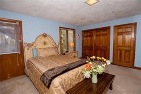 48 Mohawk Road Canton, MA 02021 - Photo 19 of 22 a bedroom with a bed and a window