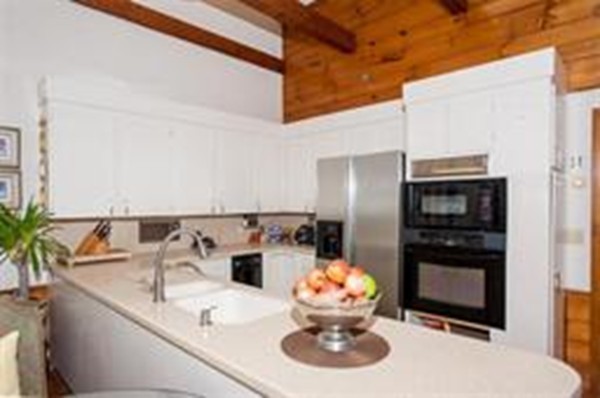 48 Mohawk Road Canton, MA 02021 - Photo 6 of 22 a kitchen with a sink and a refrigerator