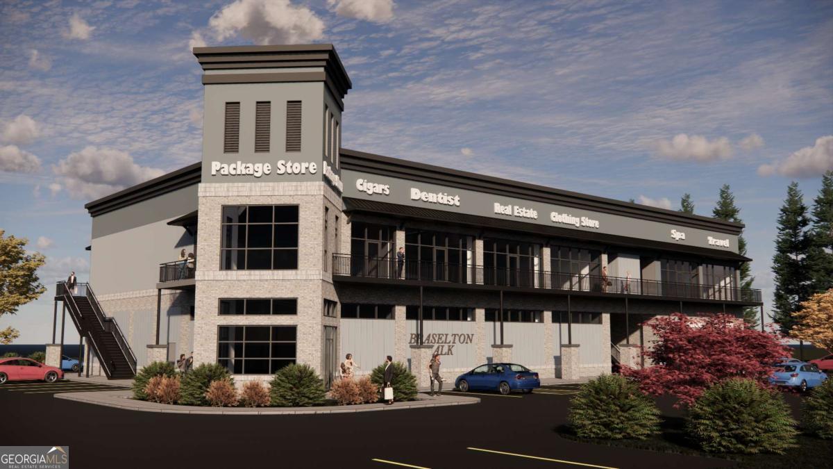 a front view of a house with plants