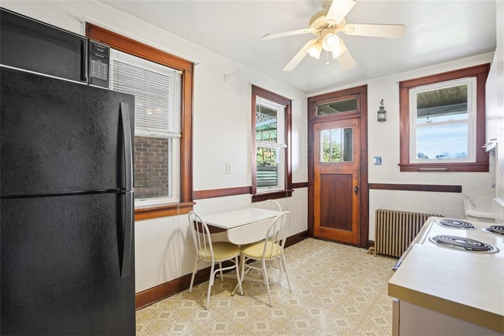 205 Clover Street Pittsburgh, PA 15210 - Photo 15 of 49 a dining room with furniture and window