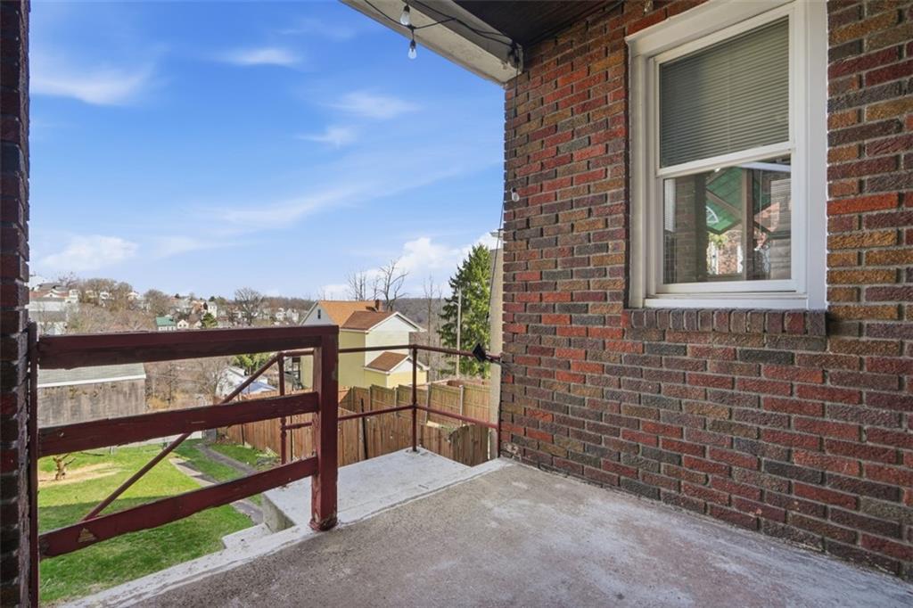 205 Clover Street Pittsburgh, PA 15210 - Photo 34 of 49 a view of a balcony with an outdoor space