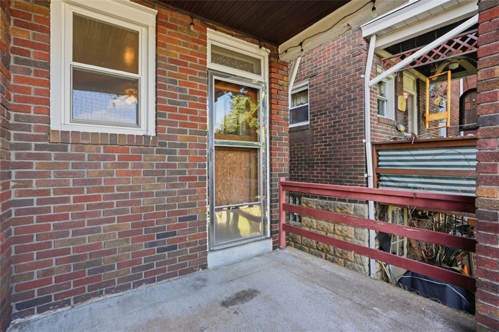 205 Clover Street Pittsburgh, PA 15210 - Photo 35 of 49 a view of front door of house with front door