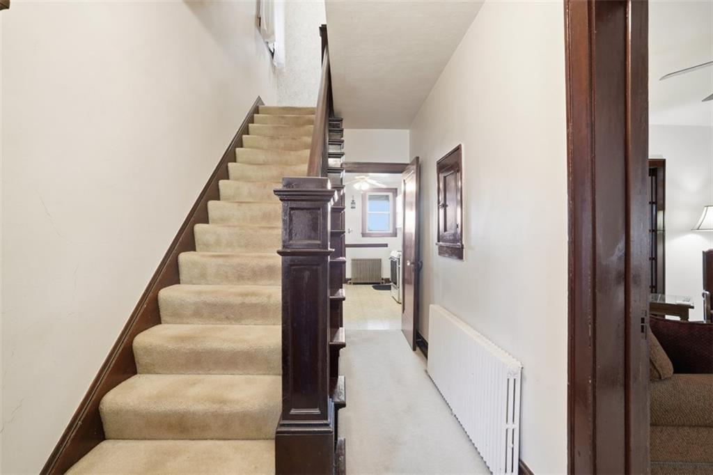 205 Clover Street Pittsburgh, PA 15210 - Photo 5 of 49 a view of entryway and hall with wooden floor