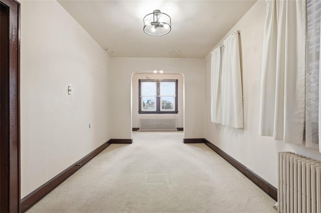 205 Clover Street Pittsburgh, PA 15210 - Photo 10 of 49 an empty room with windows