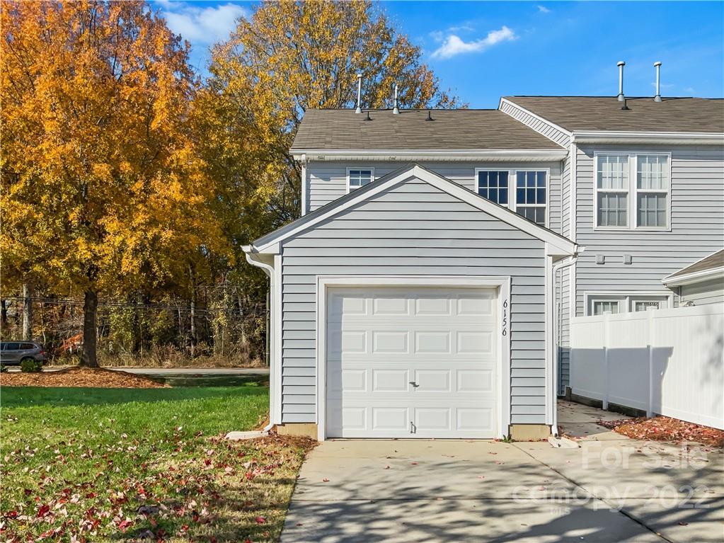 6156 Prosperity Church Road Charlotte, NC 28269 - Photo 11 of 31 a house with a outdoor space