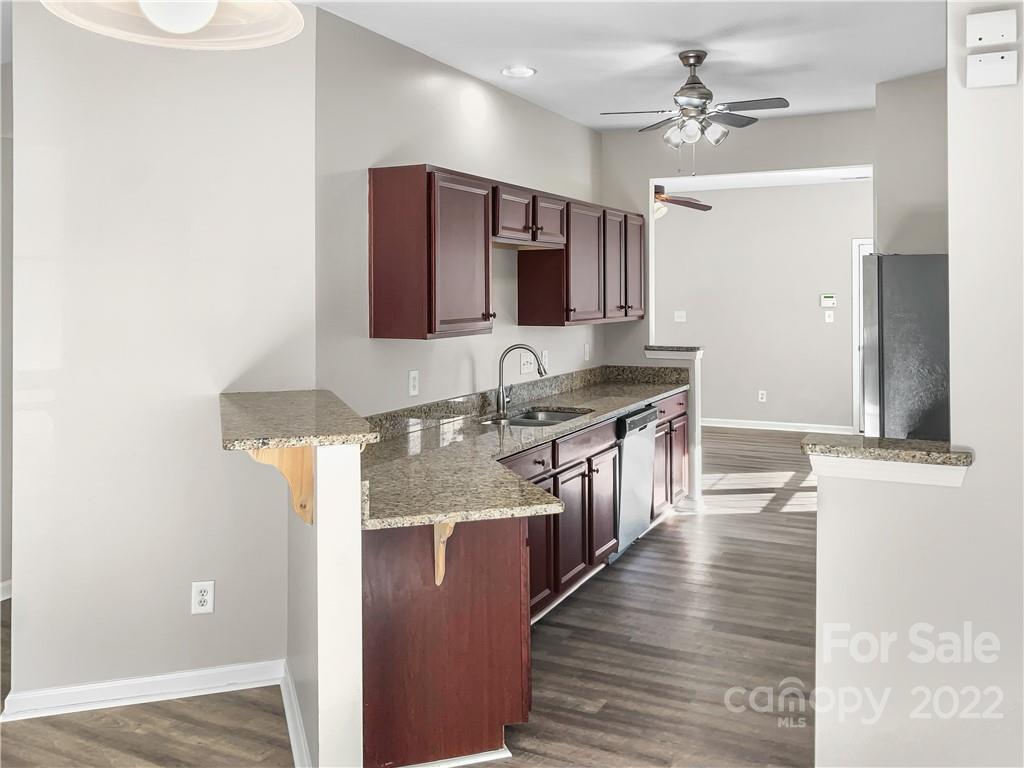6156 Prosperity Church Road Charlotte, NC 28269 - Photo 20 of 31 a large bathroom with a granite countertop double vanity sink and mirror