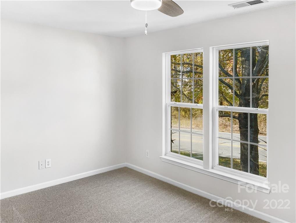 6156 Prosperity Church Road Charlotte, NC 28269 - Photo 27 of 31 an empty room with a window