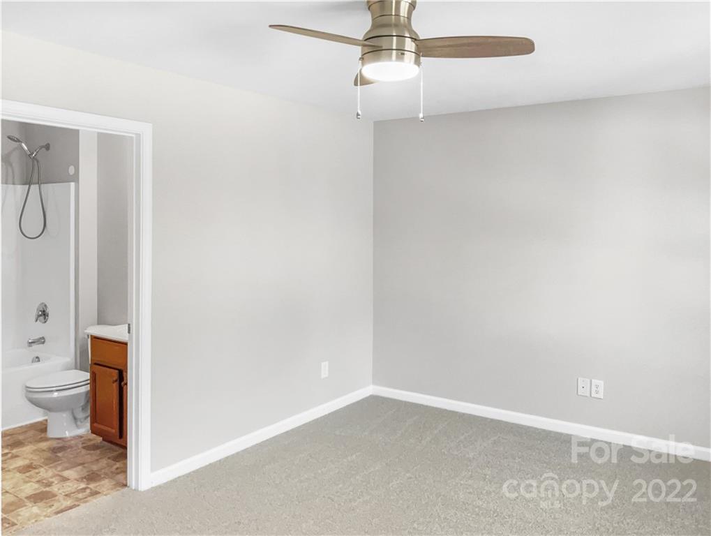 6156 Prosperity Church Road Charlotte, NC 28269 - Photo 28 of 31 a very nice looking room with a bathroom