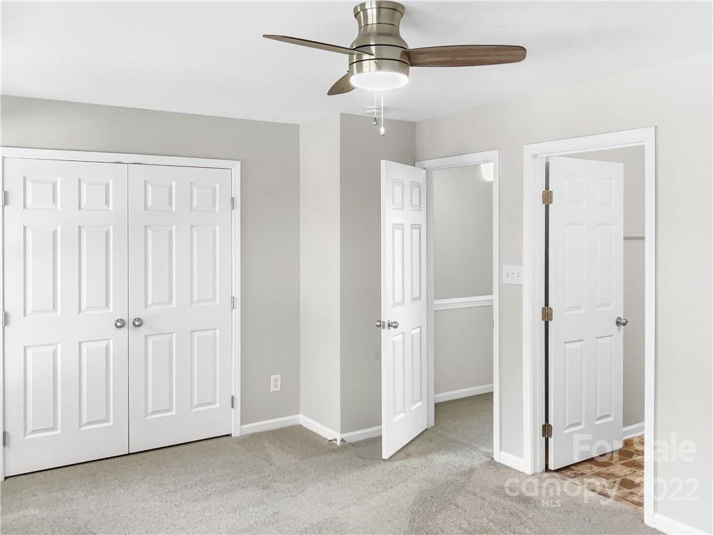 6156 Prosperity Church Road Charlotte, NC 28269 - Photo 29 of 31 an empty room with closet area