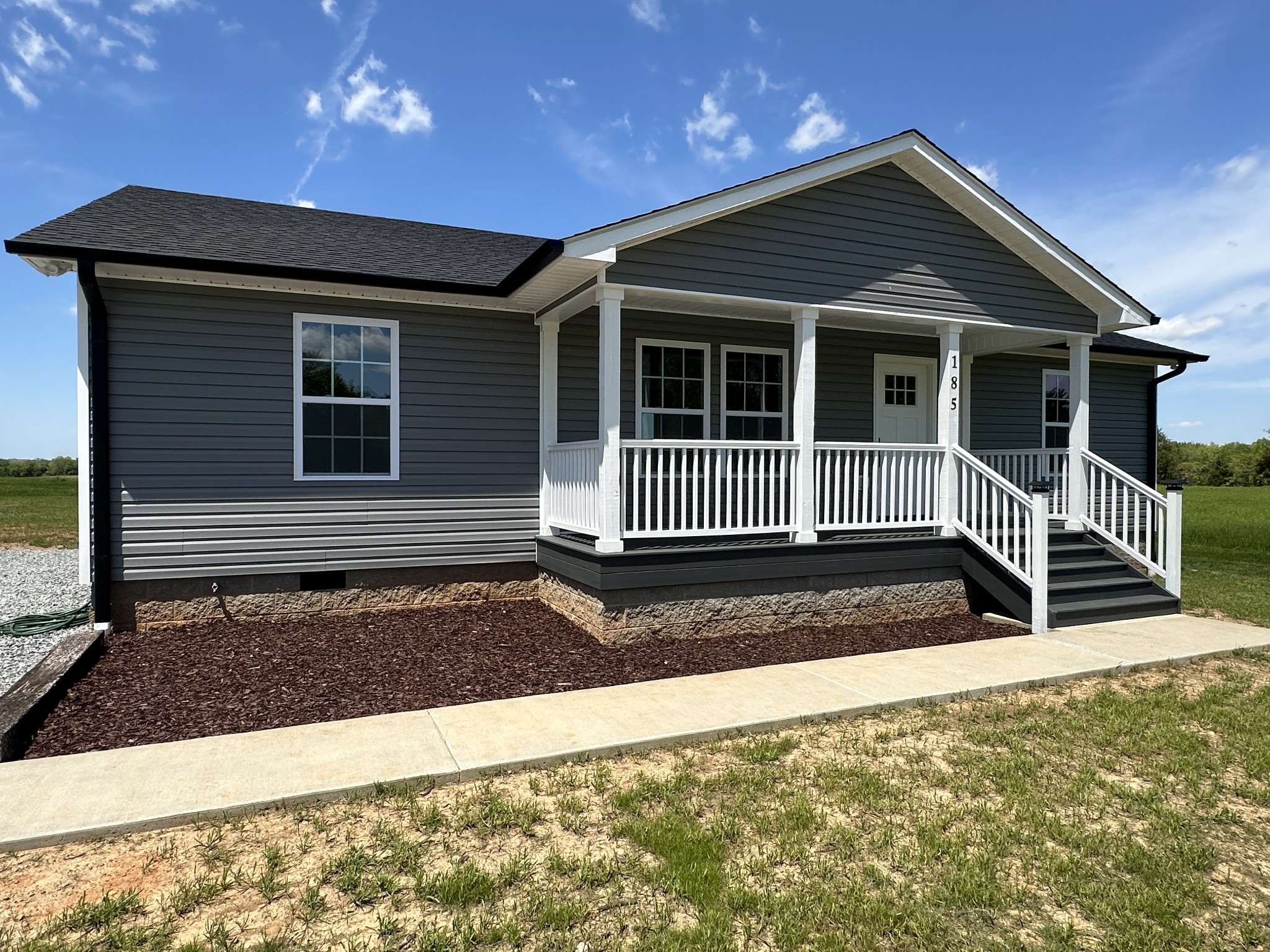 185 Rigling Road Loretto, TN 38469 - Photo 24 of 24 a front view of a house with a yard