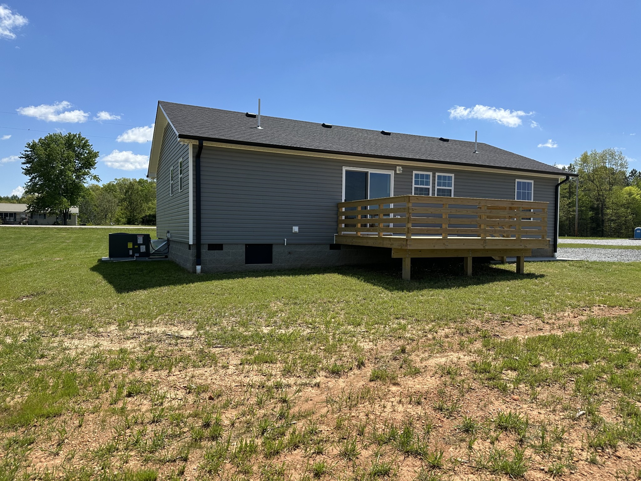 185 Rigling Road Loretto, TN 38469 - Photo 6 of 24 a view of a house with a back yard