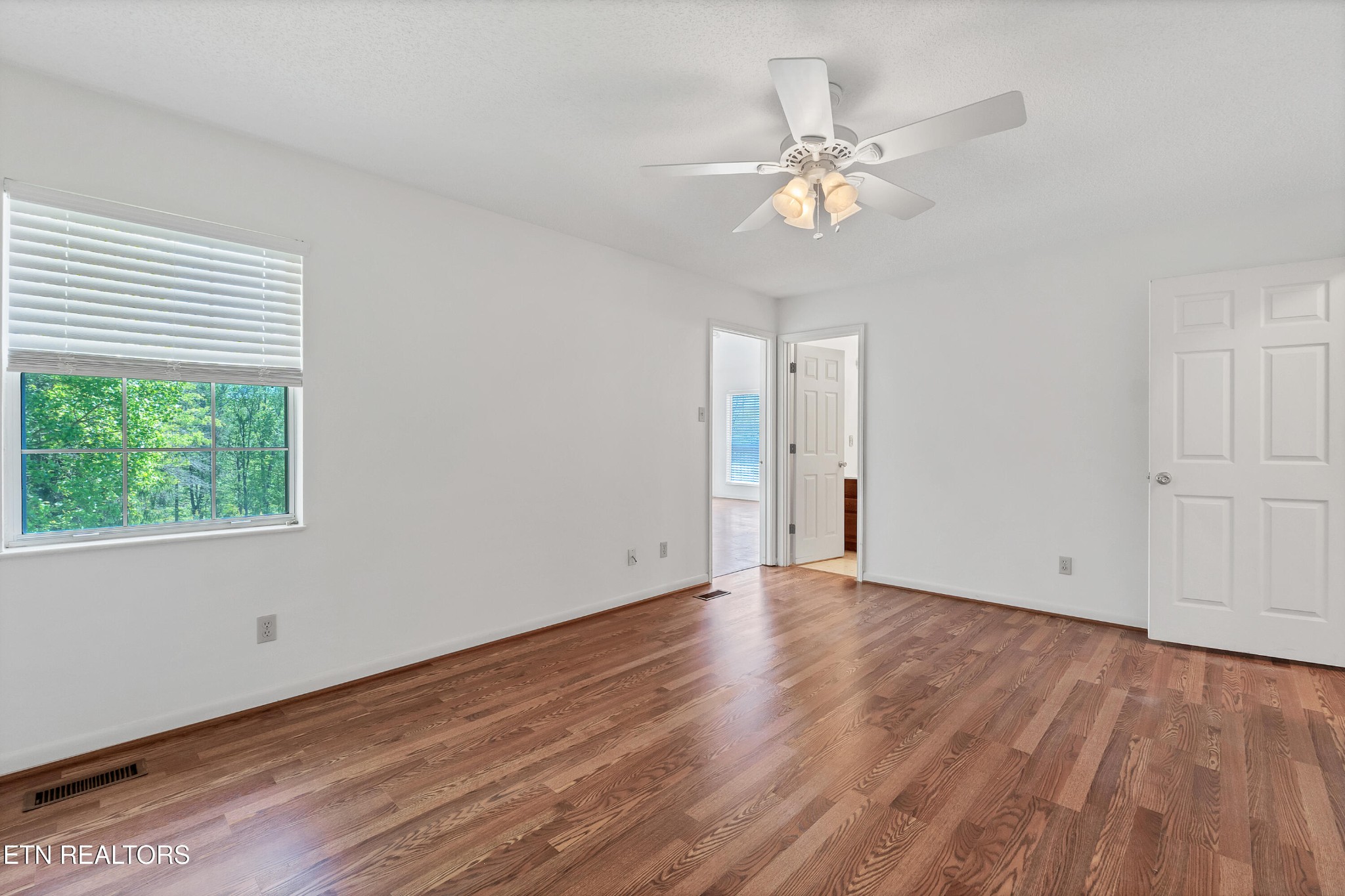 2036 Little Best Road Maryville, TN 37803 - Photo 33 of 54 a view of an empty room with wooden floor and a window