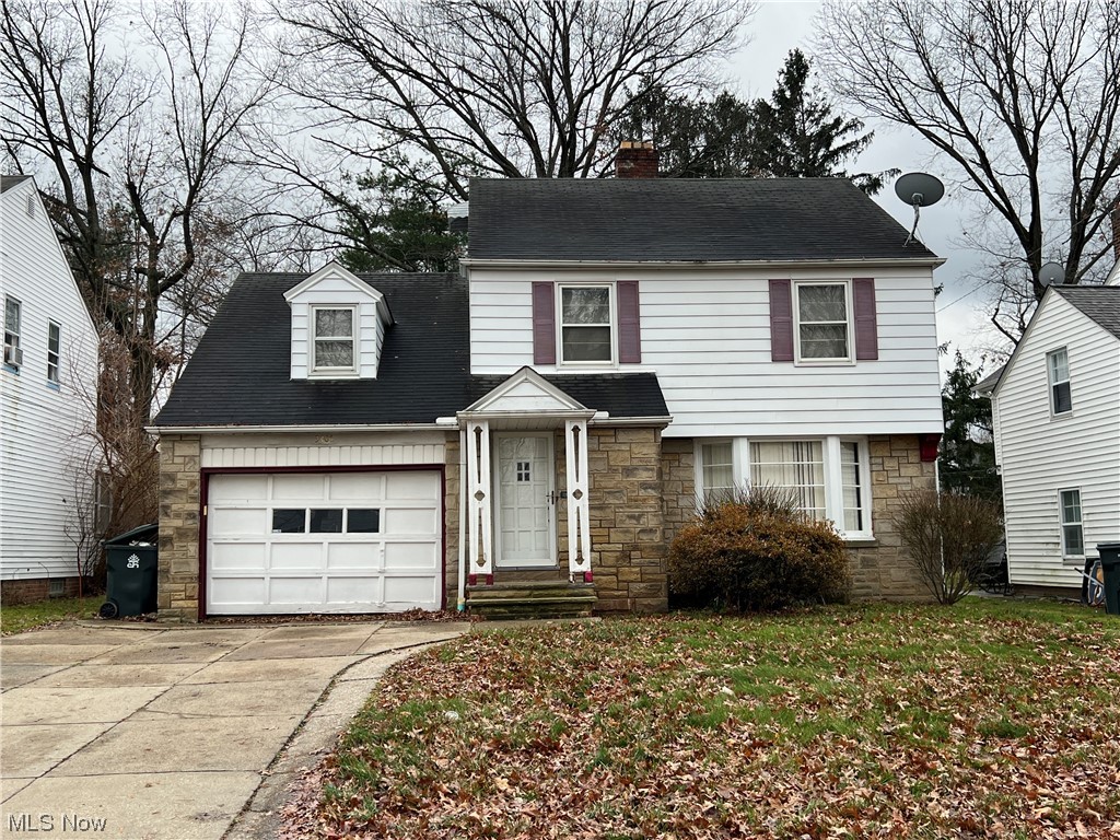 3406 Rosedale Road Cleveland, OH 44112 - Photo 1 of 20 View of front of house featuring a garage
