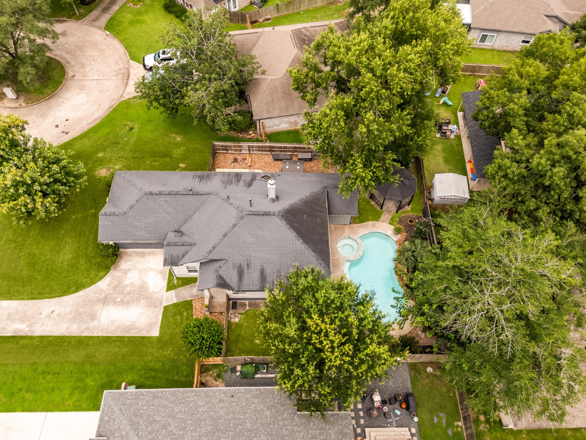 1915 Mercoal Drive Spring, TX 77386 - Photo 42 of 50 Overhead view highlighting the backyard, pool, and outdoor living spaces.