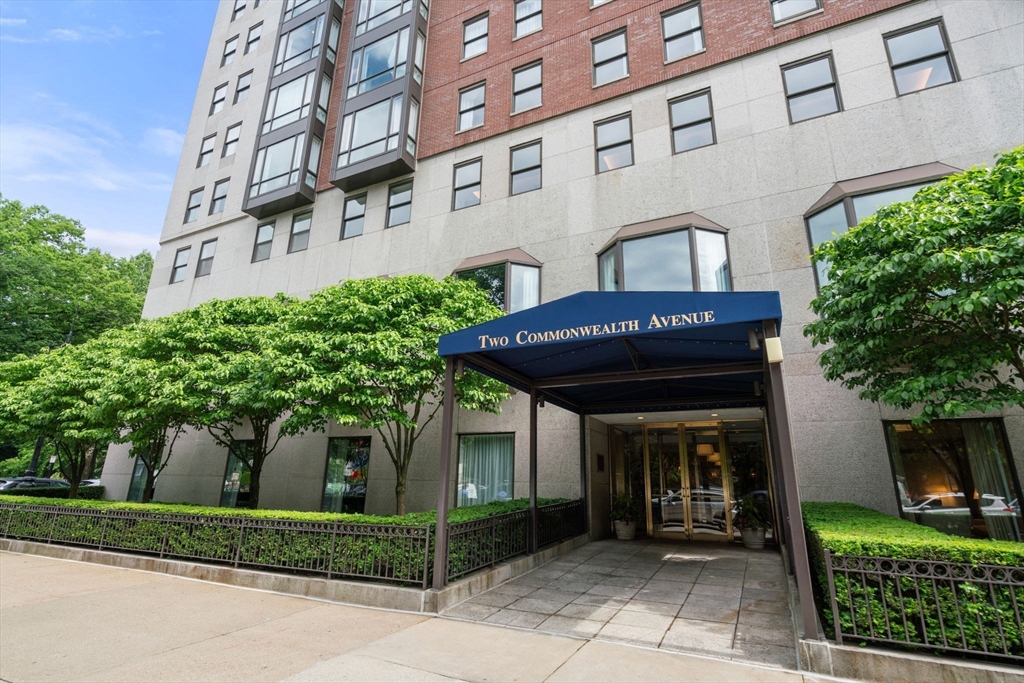 2 Commonwealth Avenue, Unit 9A Boston, MA 02116 - Photo 1 of 27 a front view of a building with garden